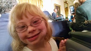 girl with down syndrome at president obama press conference