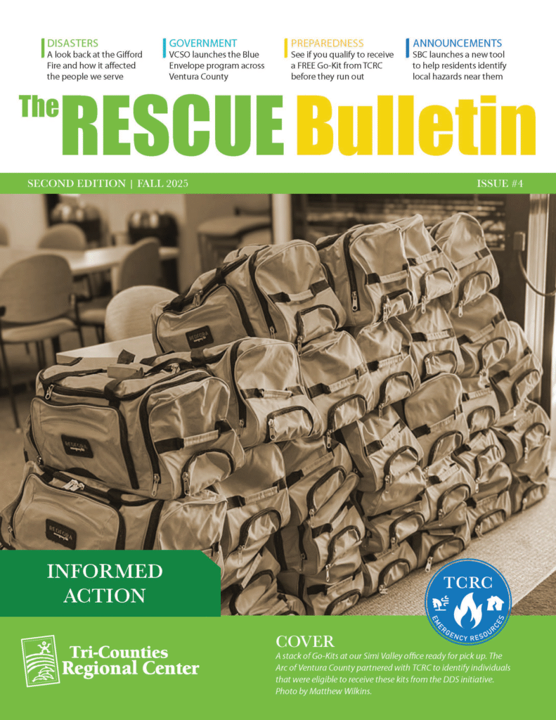 The English cover of “The RESCUE Bulletin,” Fall 2025. A sepia-toned photo shows many tan emergency Go-Kits stacked on tables in an office environment. At the top, category headers include Disasters, Government, Preparedness, and Announcements. The bottom features the Tri-Counties Regional Center logo with text about Go-Kits available for pickup.